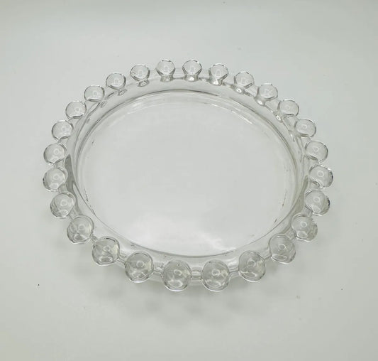 Porte-chandelle en verre clair orné de perles en verre